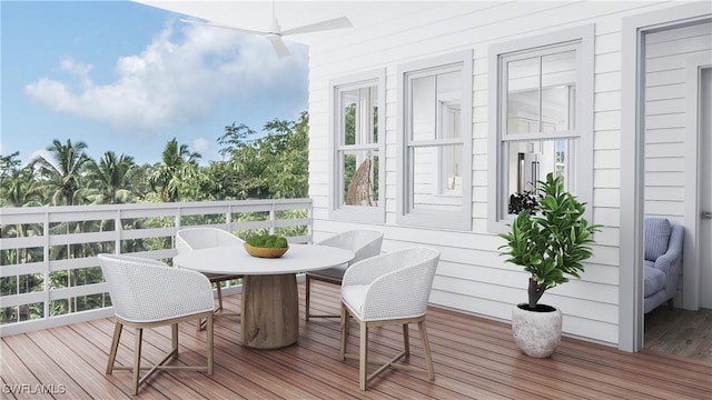 sunroom with a wealth of natural light and a ceiling fan