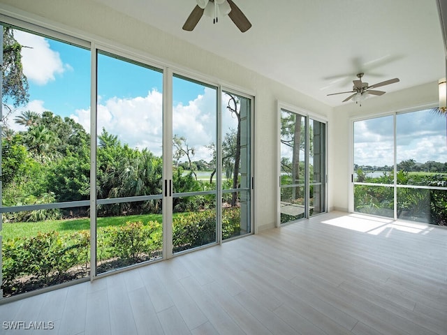 26831 Wyndhurst Ct Unit 101, Bonita Springs, FL 34134 - unfurnished sunroom with wood finished floors
