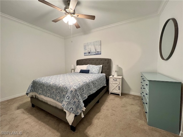 carpeted bedroom featuring ceiling fan and ornamental molding