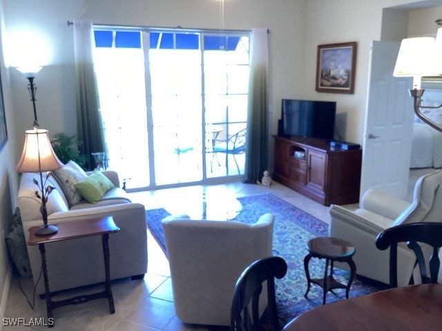 living room with light tile patterned floors