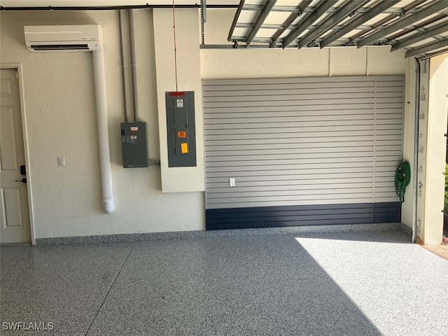 garage with electric panel and a wall mounted AC