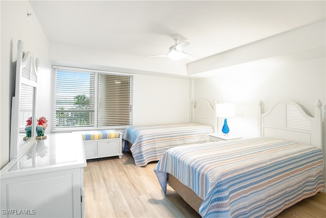 bedroom featuring ceiling fan and light wood-type flooring