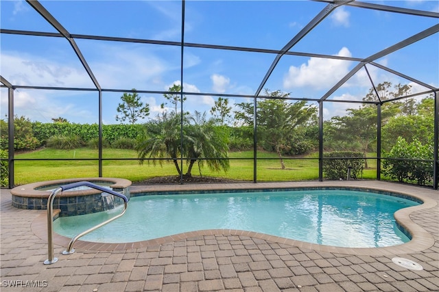 view of swimming pool featuring glass enclosure, a yard, and an in ground hot tub