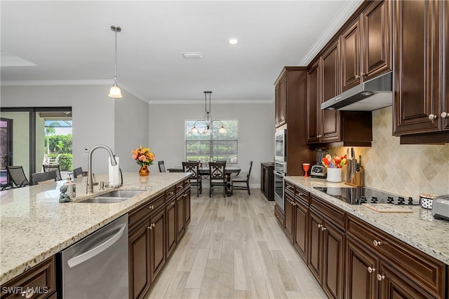 kitchen featuring dark brown cabinetry, stainless steel appliances, crown molding, sink, and decorative light fixtures