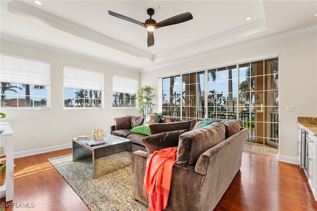 11160 Harbour Yacht Ct Unit C, Fort Myers, FL 33908 - living room featuring crown molding, a ceiling fan, a raised ceiling, and dark wood finished floors