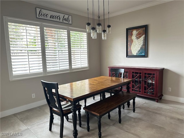 dining room featuring ornamental molding