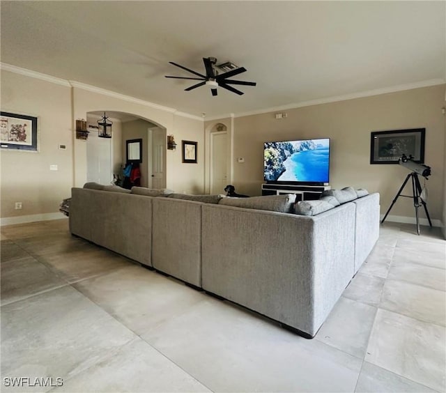 living room featuring crown molding and ceiling fan