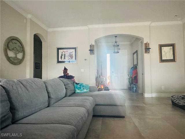 living room with ornamental molding and concrete flooring