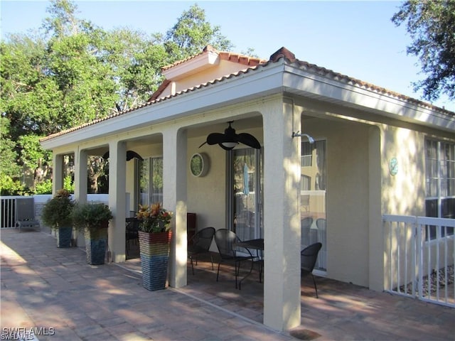 view of patio with a ceiling fan