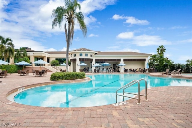 community pool featuring a patio