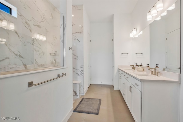 bathroom with vanity and tile patterned floors