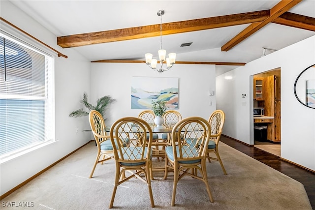 dining space featuring a chandelier, vaulted ceiling with beams, and dark wood-type flooring