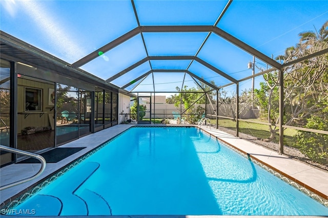 view of pool featuring a lanai