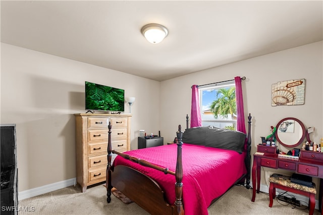 bedroom featuring carpet