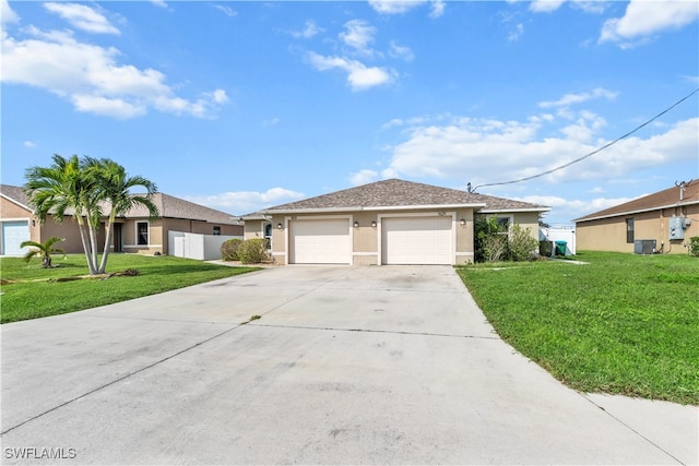 single story home with a front lawn and a garage