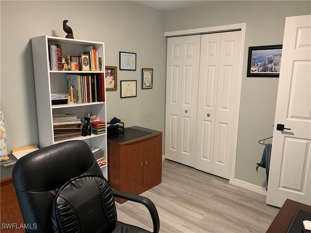 office area with light wood-type flooring