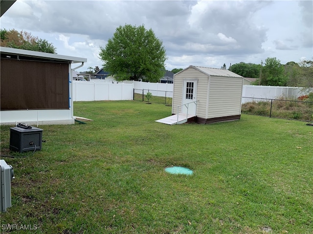 view of yard with a storage shed