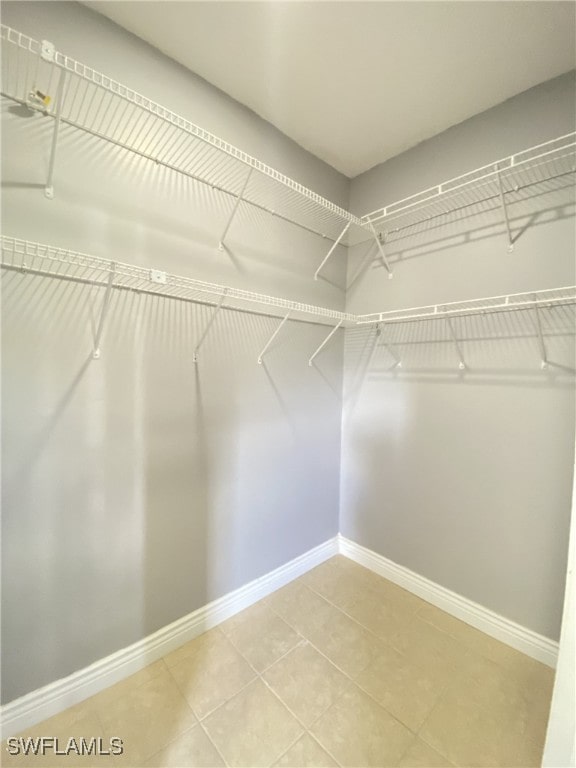 walk in closet featuring tile patterned floors