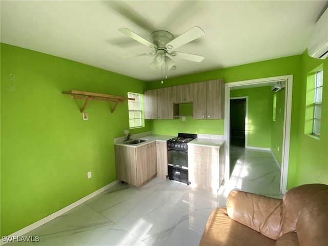 kitchen with ceiling fan, a wall mounted air conditioner, sink, range hood, and black range