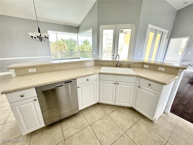 kitchen with dishwasher, sink, white cabinetry, and a healthy amount of sunlight