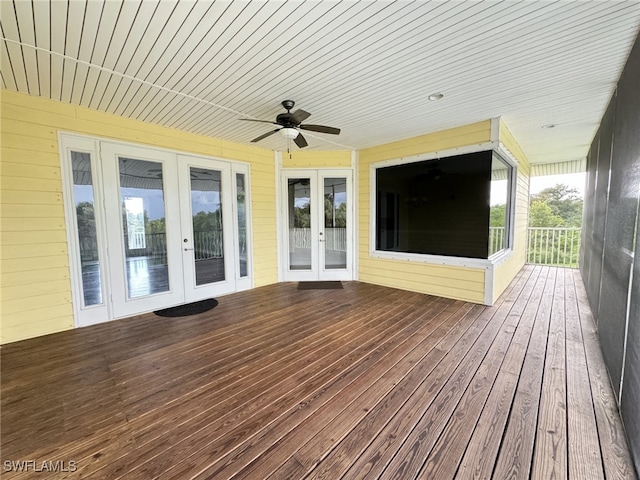 wooden deck featuring french doors and ceiling fan