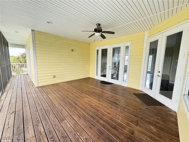 deck featuring french doors and ceiling fan