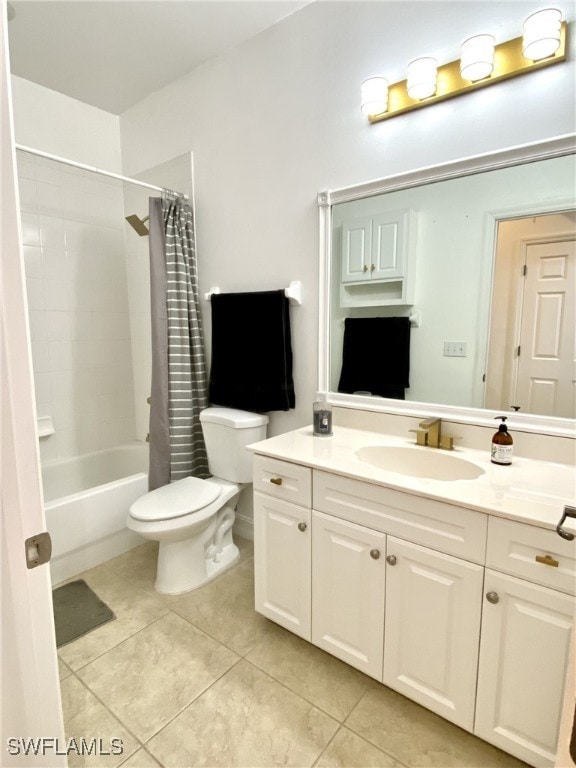 full bathroom featuring tile patterned floors, toilet, shower / tub combo, and vanity