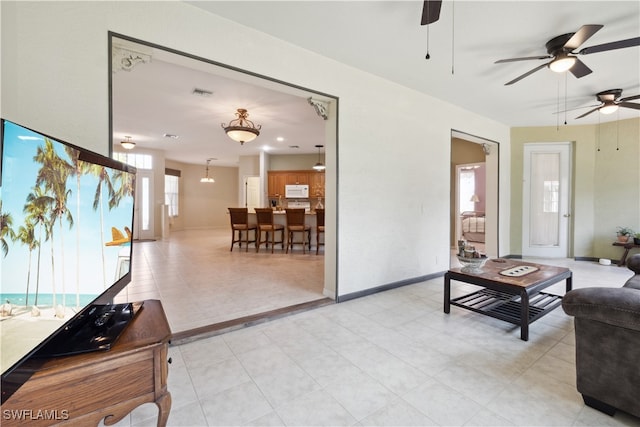 living room featuring ceiling fan