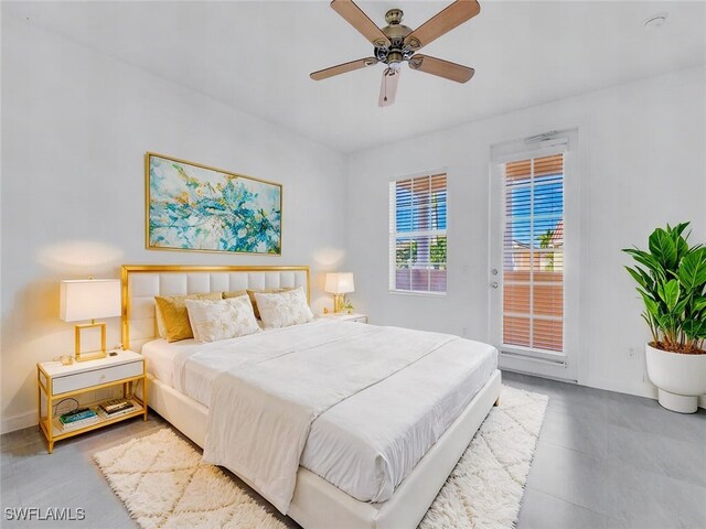 bedroom featuring access to exterior and ceiling fan