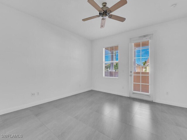 empty room featuring ceiling fan