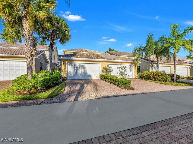 ranch-style home with a garage