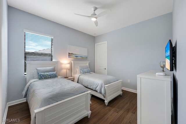 bedroom featuring dark hardwood / wood-style flooring and ceiling fan