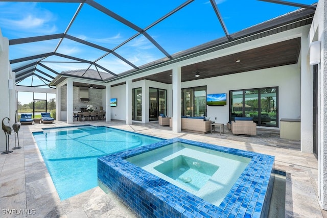 view of swimming pool featuring an in ground hot tub, outdoor lounge area, a lanai, a patio area, and ceiling fan