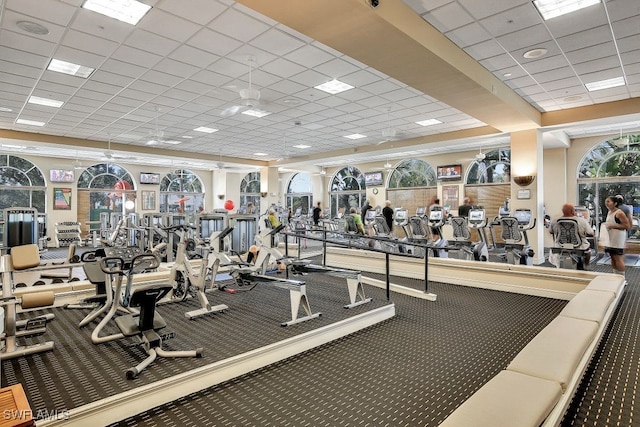 workout area featuring a paneled ceiling