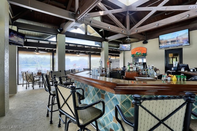 bar with vaulted ceiling with beams