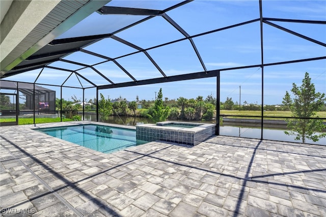 view of pool featuring a water view, an in ground hot tub, a patio area, and a lanai