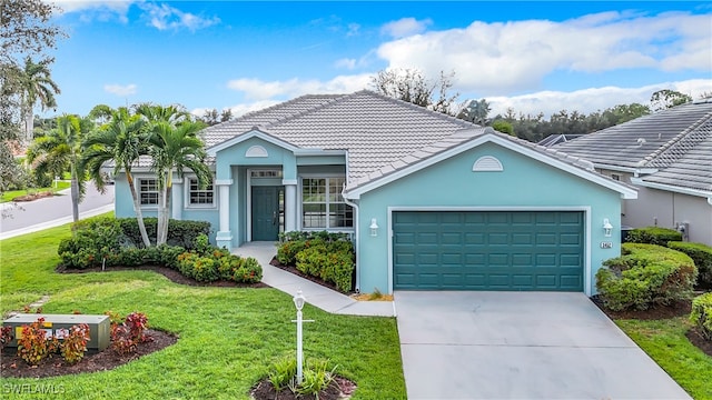 ranch-style home with a front yard and a garage