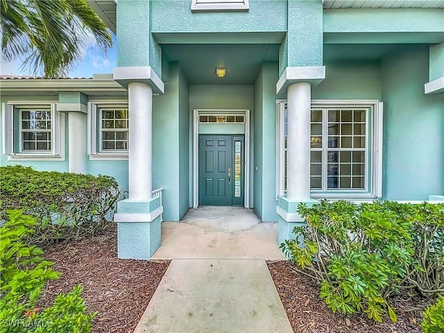 3452 Via Montana Way N, Fort Myers, FL 33917 - property entrance featuring stucco siding