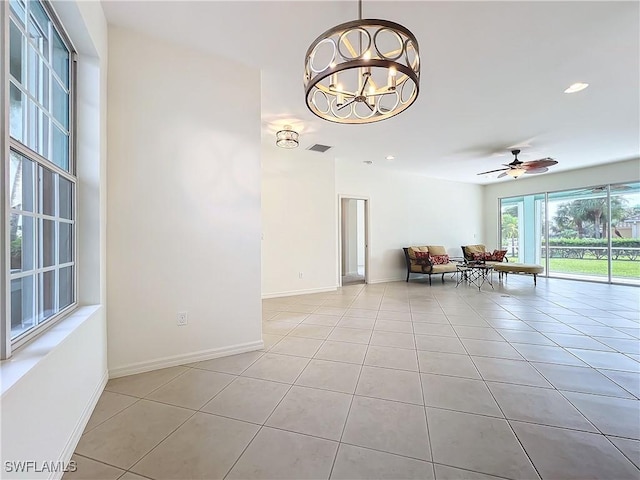 3452 Via Montana Way N, Fort Myers, FL 33917 - interior space featuring recessed lighting, ceiling fan with notable chandelier, baseboards, and light tile patterned floors