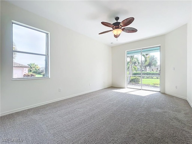 3452 Via Montana Way N, Fort Myers, FL 33917 - empty room with baseboards, a ceiling fan, and carpet