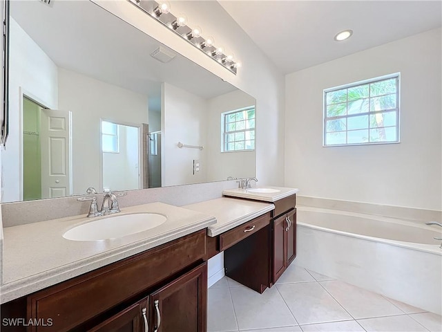 3452 Via Montana Way N, Fort Myers, FL 33917 - full bath with a bath, tile patterned floors, a sink, and double vanity