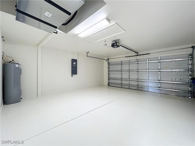 3452 Via Montana Way N, Fort Myers, FL 33917 - garage with electric panel, water heater, and a garage door opener