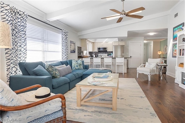 living room with ceiling fan, lofted ceiling with beams, and dark hardwood / wood-style floors