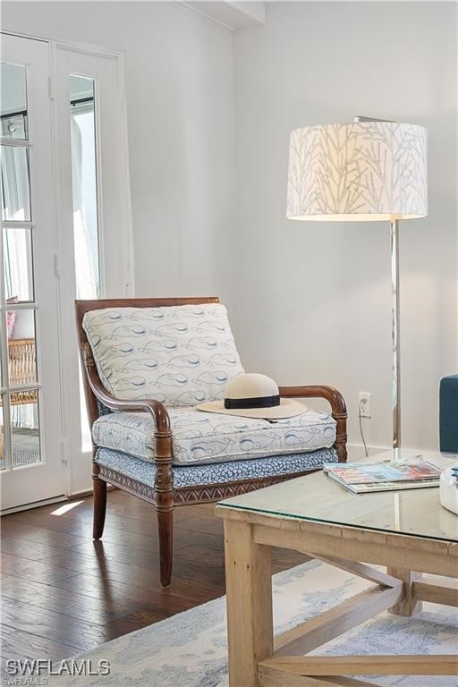 sitting room featuring hardwood / wood-style floors