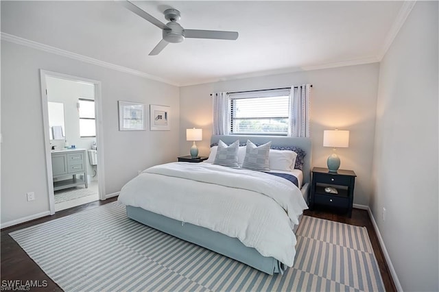 bedroom with ornamental molding, ceiling fan, dark hardwood / wood-style floors, and connected bathroom