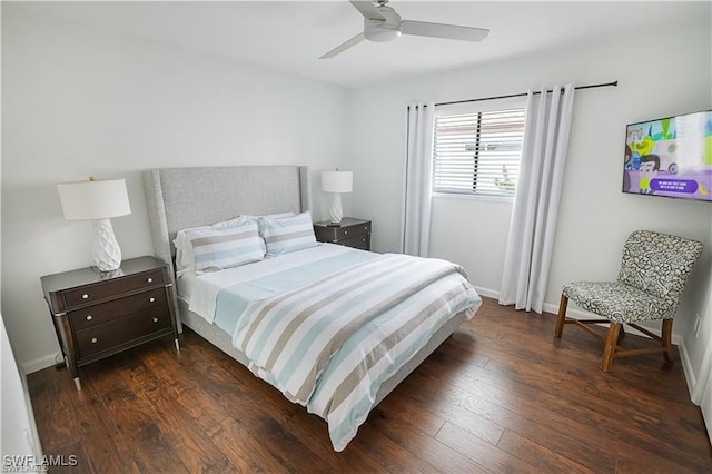 bedroom featuring dark wood-type flooring and ceiling fan