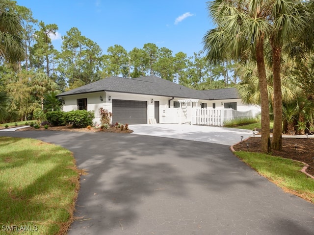 single story home with a garage