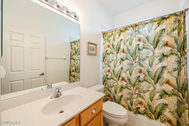 full bathroom with shower / bath combination with curtain, vanity, and toilet