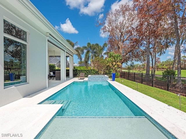 view of swimming pool featuring a patio, an in ground hot tub, and a yard