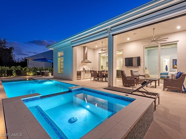 view of swimming pool featuring outdoor lounge area, an in ground hot tub, a patio, and ceiling fan